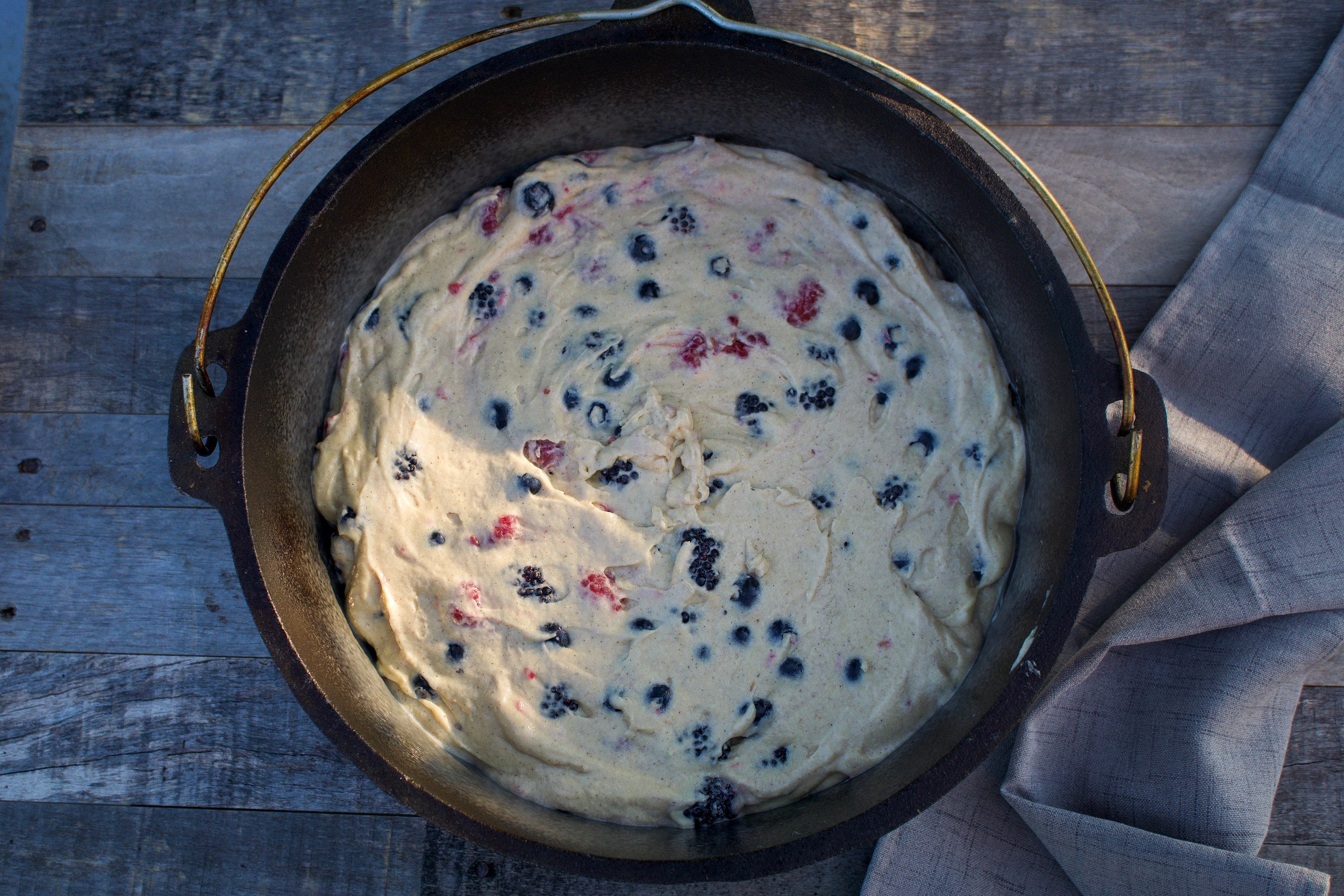 Alaskan Blueberry Cake batter from scratch in Dutch oven
